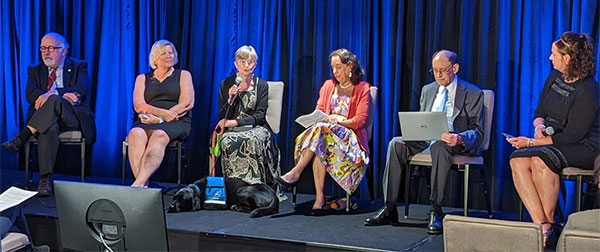 HLAA Director of Public Policy Lise Hamlin speaks on one of several panels she participated in at the Telecommunications for the Deaf and Hard of Hearing, Inc. (TDI) Conference, July 2023.