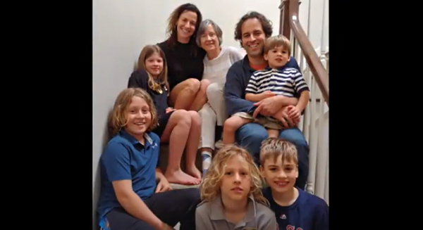 Video screenshot of Brenda Battat with daughter, son and grandchildren