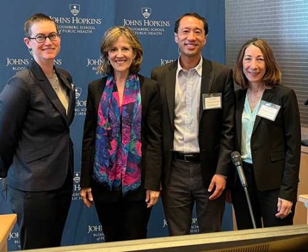 Carrie Nieman, M.D., MPH. & Johns Hopkins Cochlear Implant Center Director Frank Lin, M.D., Ph.D., with Kelley & Director of Development Marilyn DiGiacobbe at Cochlear Research Day, April 28, 2023.