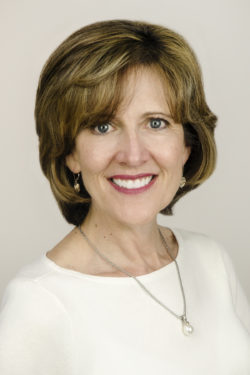HLAA Executive Director, Barbara Kelley in white sweater
