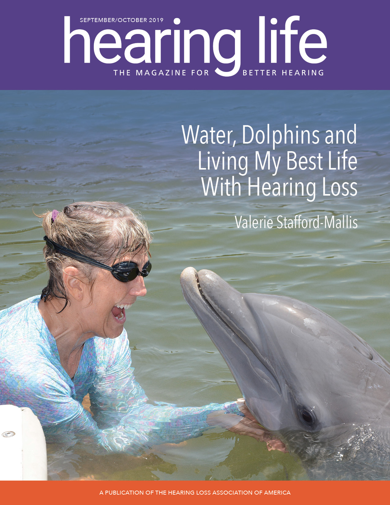 HLAA Hearing Life 2019 September/October Cover with Valerie Stafford-Mallis in the water with a dolphin