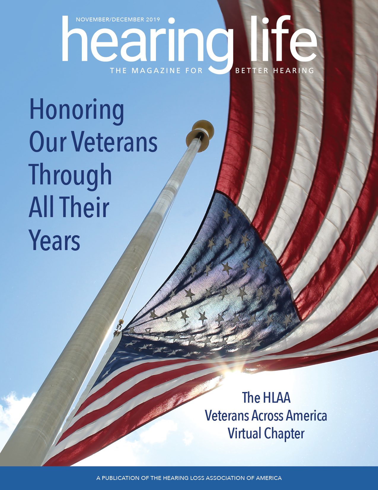 HLAA Hearing Life 2019 November/December Cover with an American flag waving in the wind with blue skies